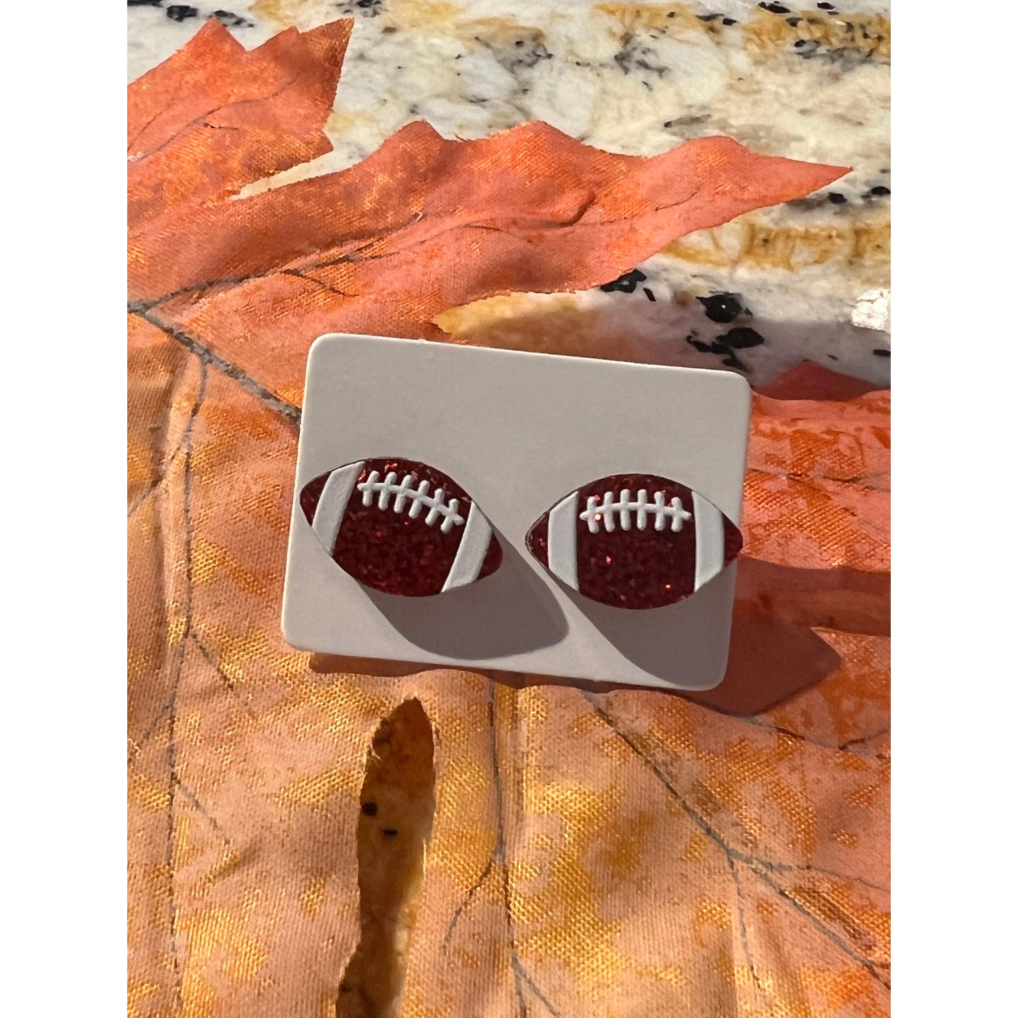 FOOTBALL GLITTER STUDS-Body and Sol
