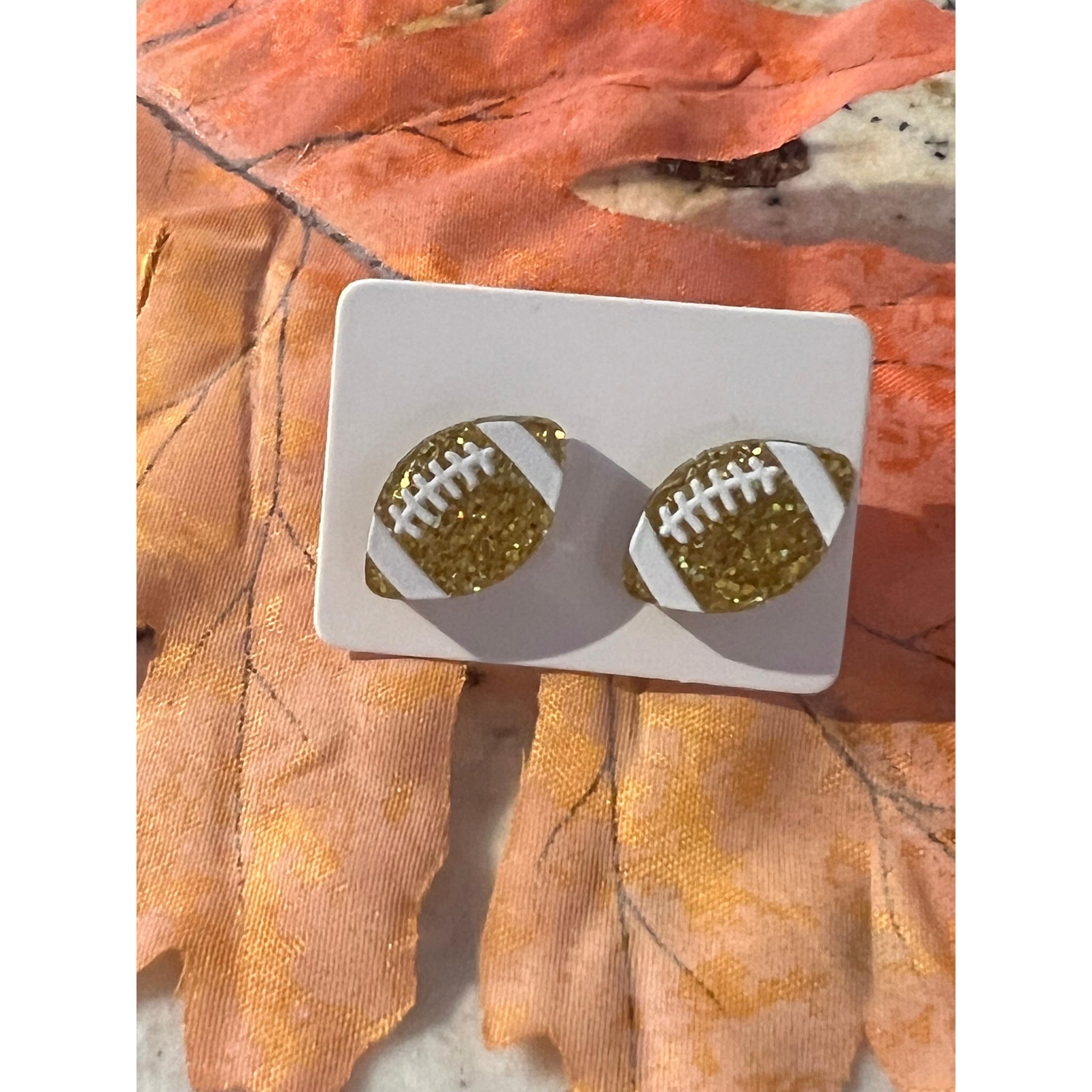 FOOTBALL GLITTER STUDS-Body and Sol